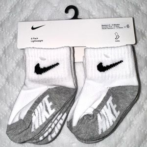 NIKE Infant Boys or Girls Logo Socks, Pack of 6. Size 6-12 months